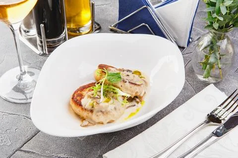 Fish cutlets in restaurant serving Stock Photos