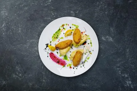 Fish cutlets stuffed with quail eggs with mashed potatoes. Stock-Fotos