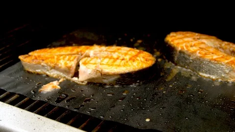 Fish cuts being grilled with fire Stock Footage 130063765