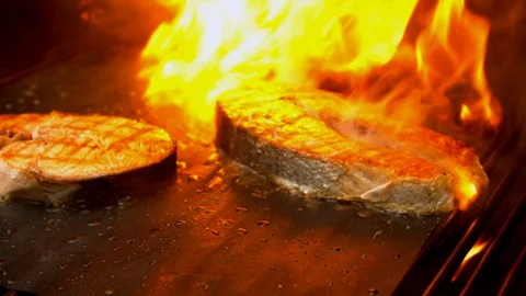 Fish cuts being grilled with fire Stock Footage 130067886
