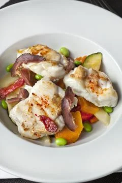 Fish dish and vegetable Stock Photos