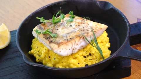 Fish dish with a side dish. Stock Footage 131131583