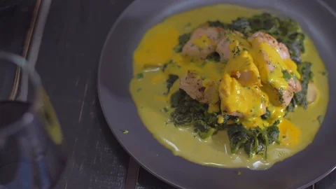 Fish dish with spinach decorated with basil Video stock 111966657