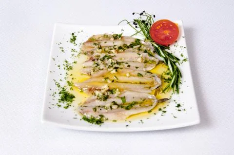Fish dish on a white background Stock Photos