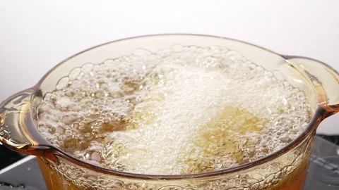 Fish Droping in The Pan Frying Video stock 232367373