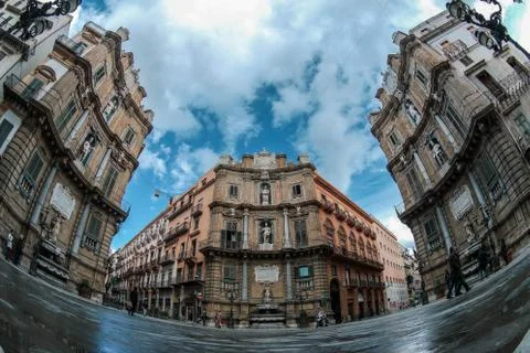 Fish eye of a square rounded by old buildings Stock-Fotos