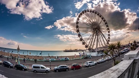 Fish eye time lapse view of the Victorian Brighton Pier and the Brighton wheel Stock Footage 84416451