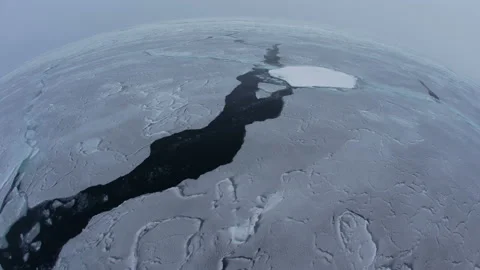 Fish-eye view of prickling ice from top to bottom. Ice puzzles. Beautiful Stock Footage 219018929