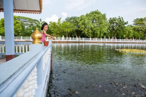 Fish feeding at the temple Stock Photos