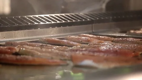 Fish filet on the grill plate Video stock 74474772