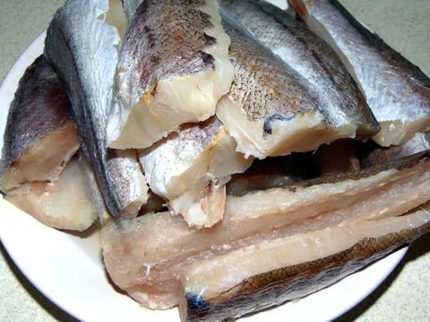 Fish fillets on a plate Stock Photos