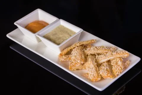 Fish fillets with sauces Stock Photos