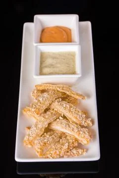 Fish fillets with sauces Stock Photos