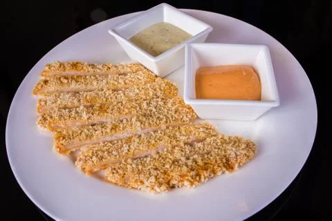 Fish fillets with sauces Stock Photos