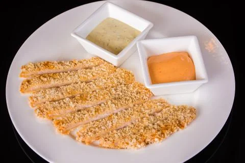 Fish fillets with sauces Stock Photos
