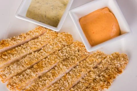 Fish fillets with sauces Stock Photos