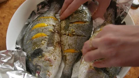 Fish In Foil For Baking Stock Footage 146440824