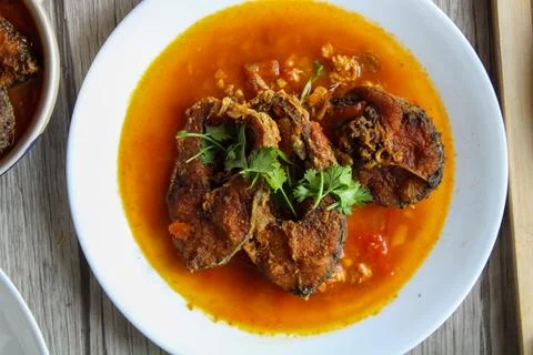 Fish fried curry Stock Photos