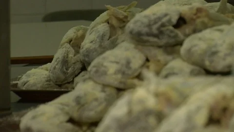 Fish fried in a frying pan until golden brown,Pieces of fresh fish are fried in  動画素材 90237998