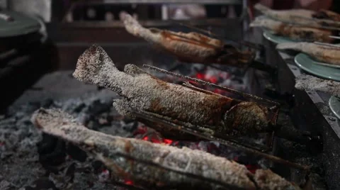 Fish fried on a grill, cooking,  rotating. Asia Food Sea Vacation Holiday Dinner Stock Footage 46672803