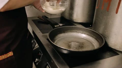 Fish fried in a pan.  Zoom Stock Footage 68430777
