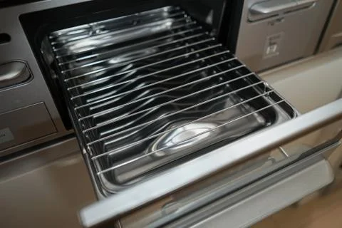 Fish grill of the new system Kitchen Stock Photos