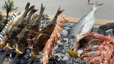 Fish grill with wood fire, a BBQ feast from the sea Video stock 338158977