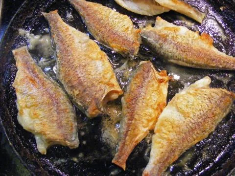 Fish Grilling Stock Photos