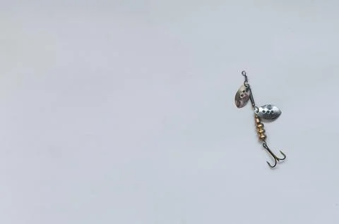 Fish hook with shiny bait Stock Photos