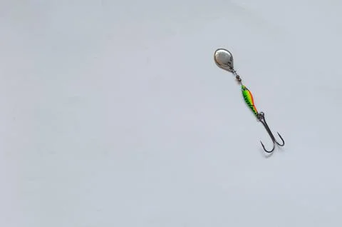 Fish hook with shiny bait Stock Photos