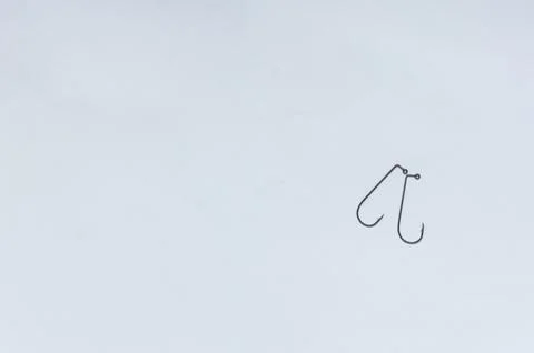Fish hook with shiny bait Stock Photos