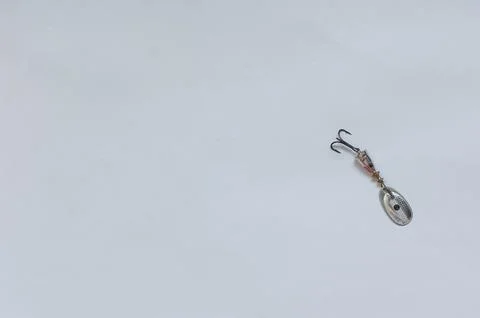Fish hook with shiny bait Stock Photos