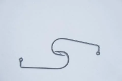 Fish hook with shiny bait Stock Photos