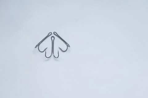 Fish hook with shiny bait Stock Photos