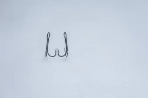 Fish hook with shiny bait Stock Photos