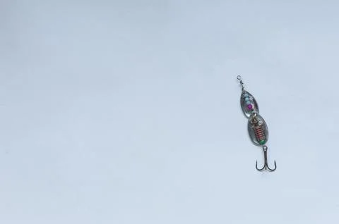 Fish hook with shiny bait Stock Photos