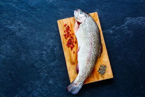 Fish with ingredients Stock Photos