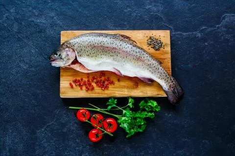 Fish with ingredients Stock Photos