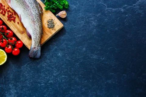 Fish with ingredients Stock Photos