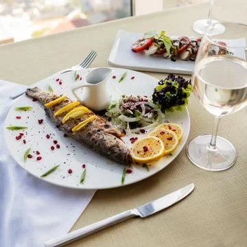 Fish with lemon Stock Photos