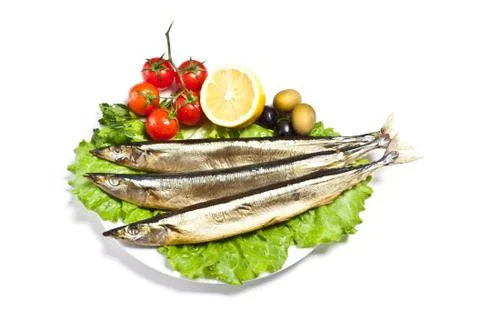 Fish with lemon on plate Foto stock