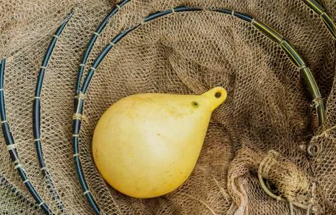 Fish Net and Buoy Stock Photos