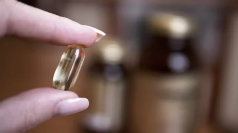Fish Oil Capsule: Close Up Stock Footage 312005268