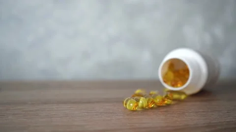 Fish oil in capsules is on the table. Stock Footage 140285165