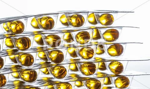 Fish oil pills over Stock Photos