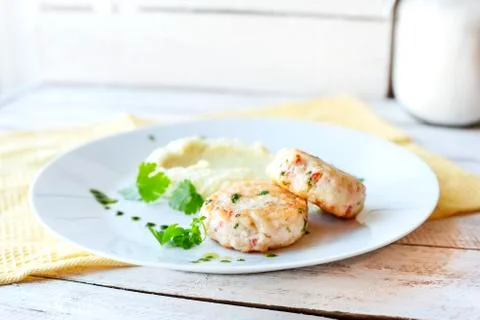 Fish or chicken cutlets with mashed potatoes Stock Photos