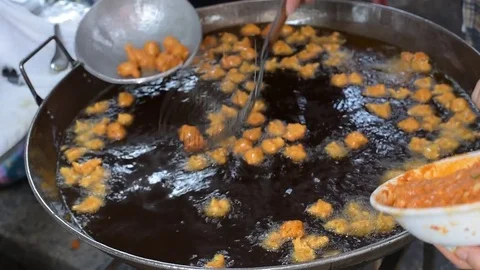 Fish or shrimp fried in hot frying pan ,thailand Stock Footage 79866120