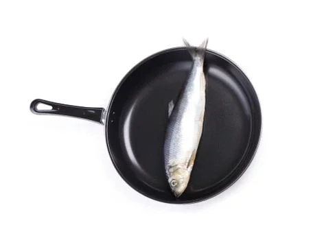 Fish on pan Stock Photos