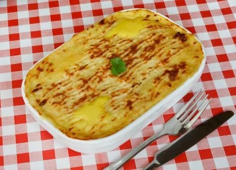 Fish pie on cafe table Stock Photos