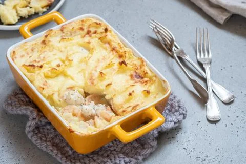 Fish pie topped with mashed potato Stock Photos